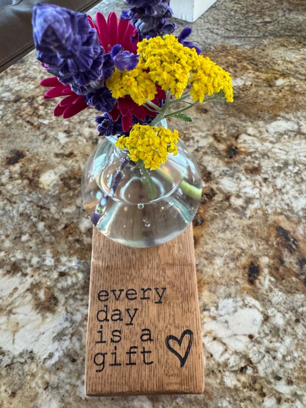 Handcrafted engraved bud vase holder created from a wine barrel stave!